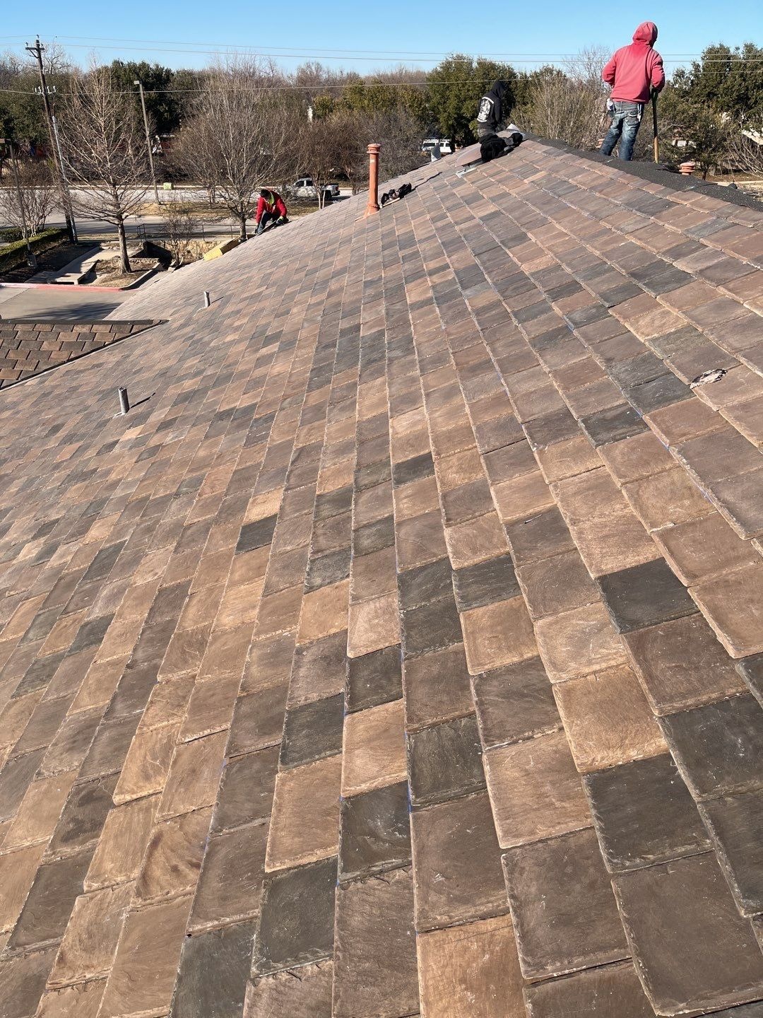 Finished tile pattern showing randomized mix after the roof replacement in McKinney, TX