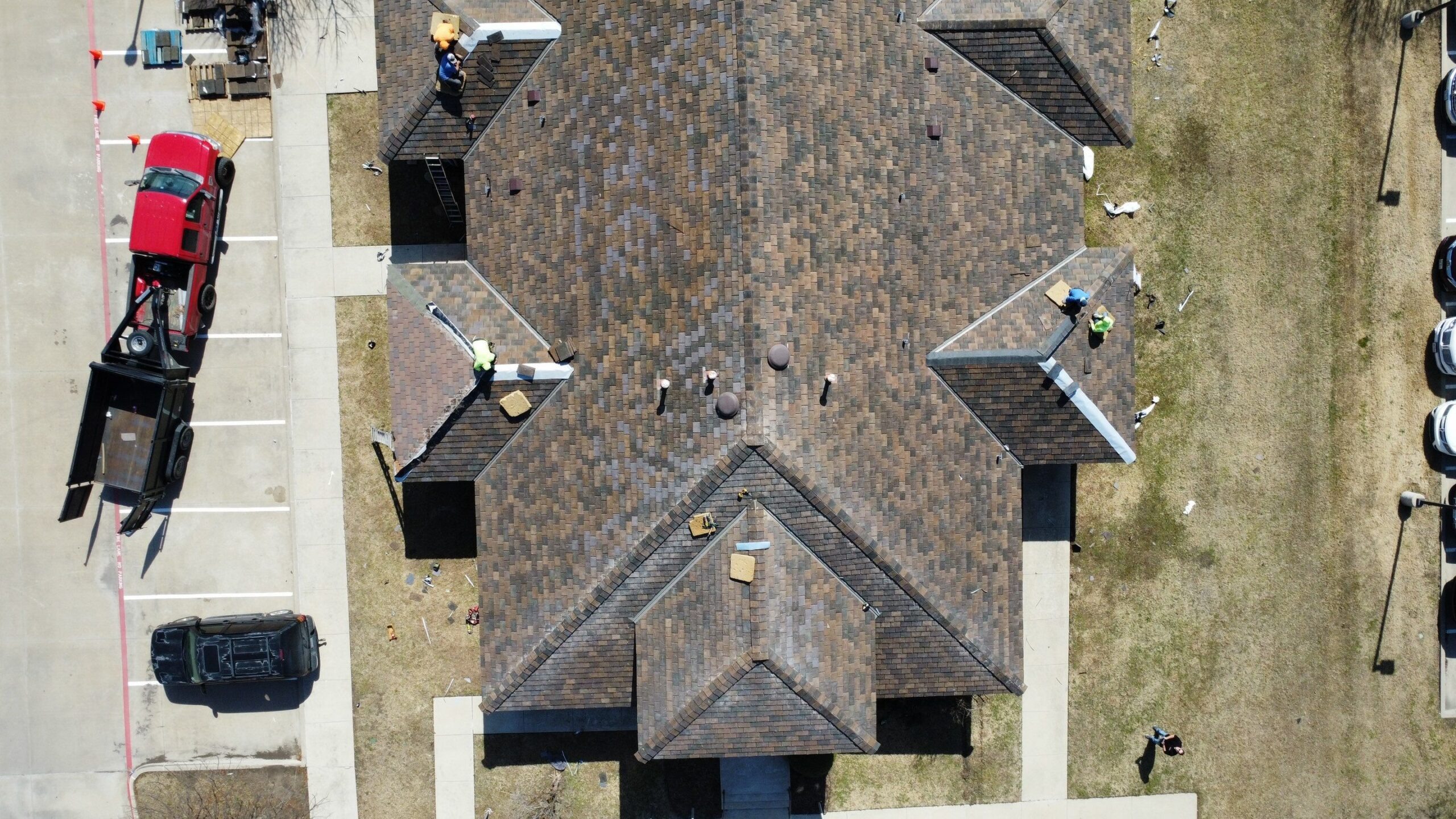 Roof edge detail showing completed tile work after the roof replacement in McKinney, TX
