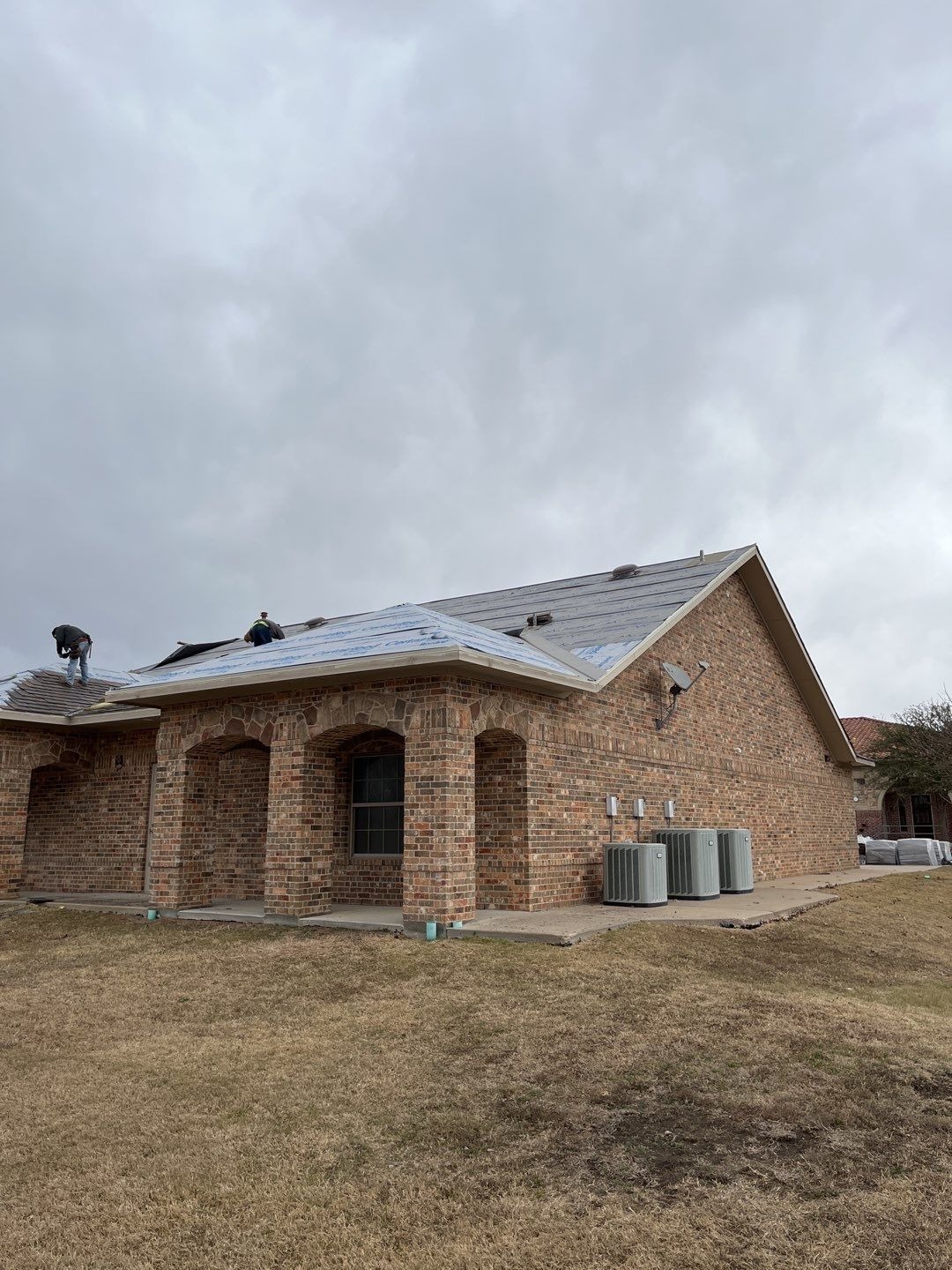 Underlayment coverage across a roof section during the roof replacement in McKinney, TX