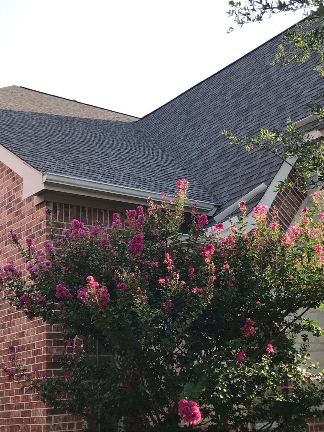 Close-up of hail impact marks before the roof replacement in Allen, TX