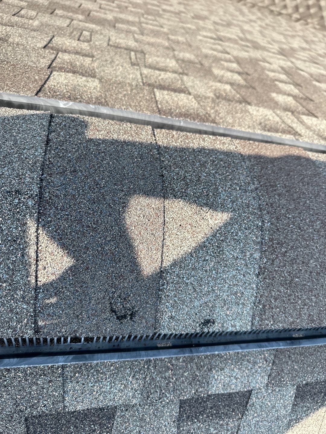 Roof vent showing hail damage before the roof replacement in Allen, TX