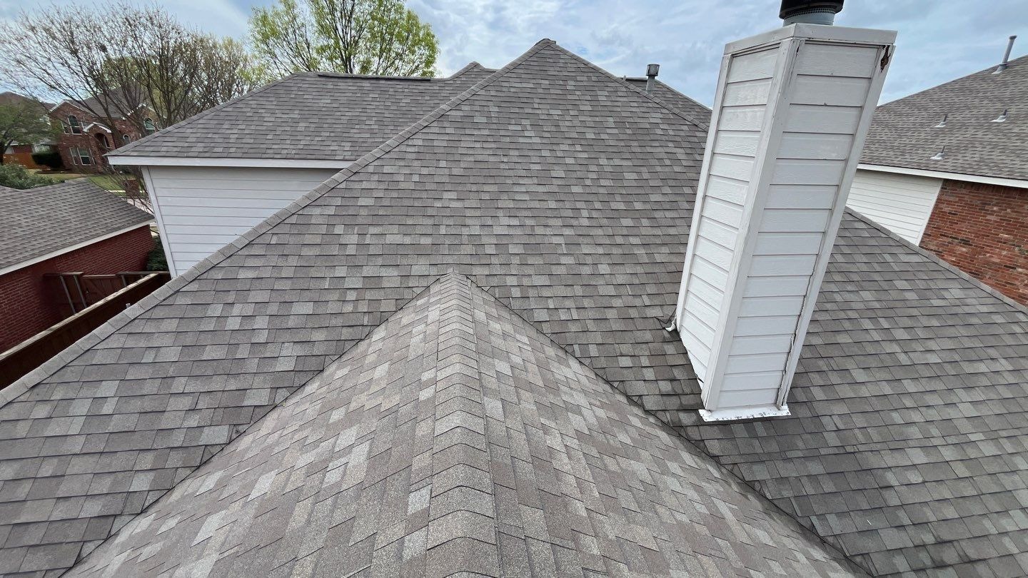 Cracked shingle mat found during inspection before the Allen roof replacement