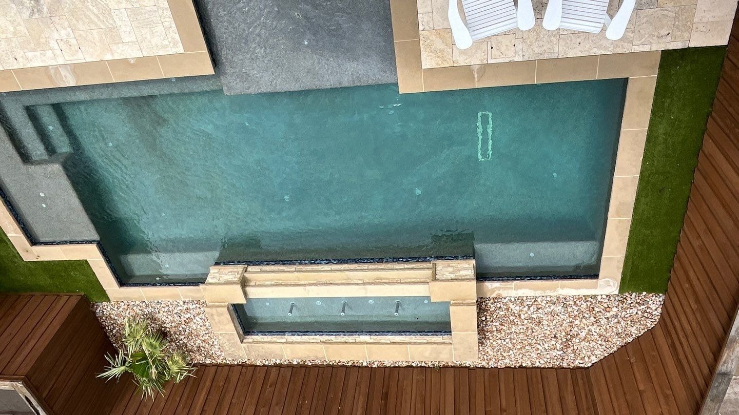 Close-up of hail impact marks across the roof before replacement work