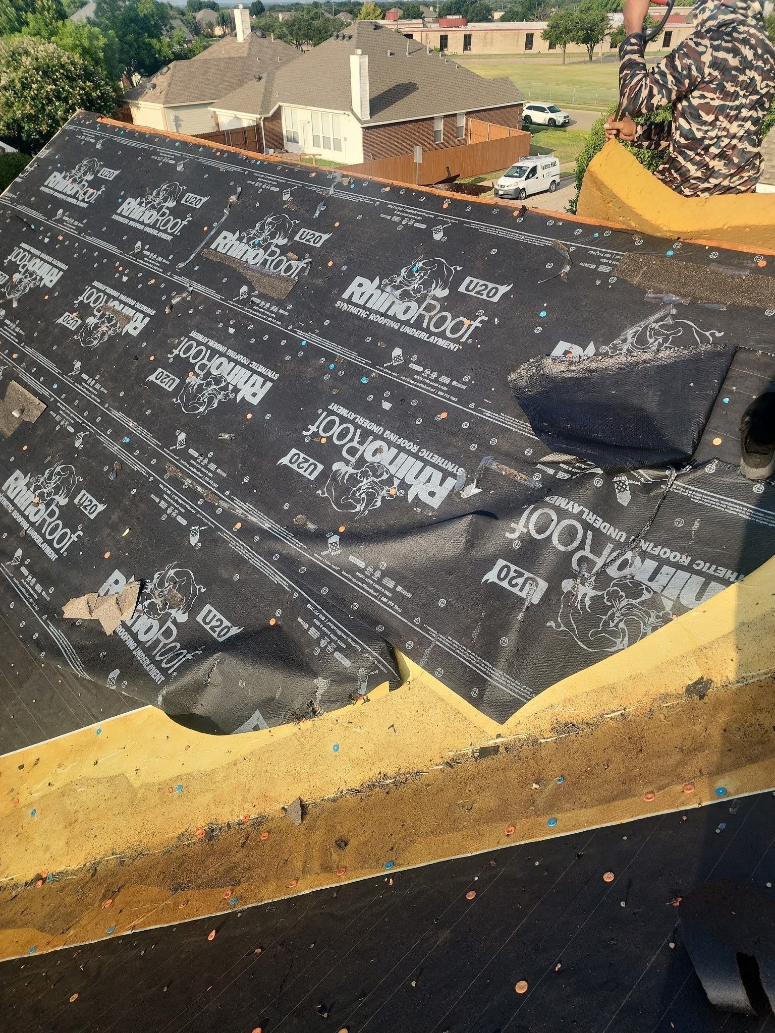 Bare deck visible after full removal during the Allen roof replacement