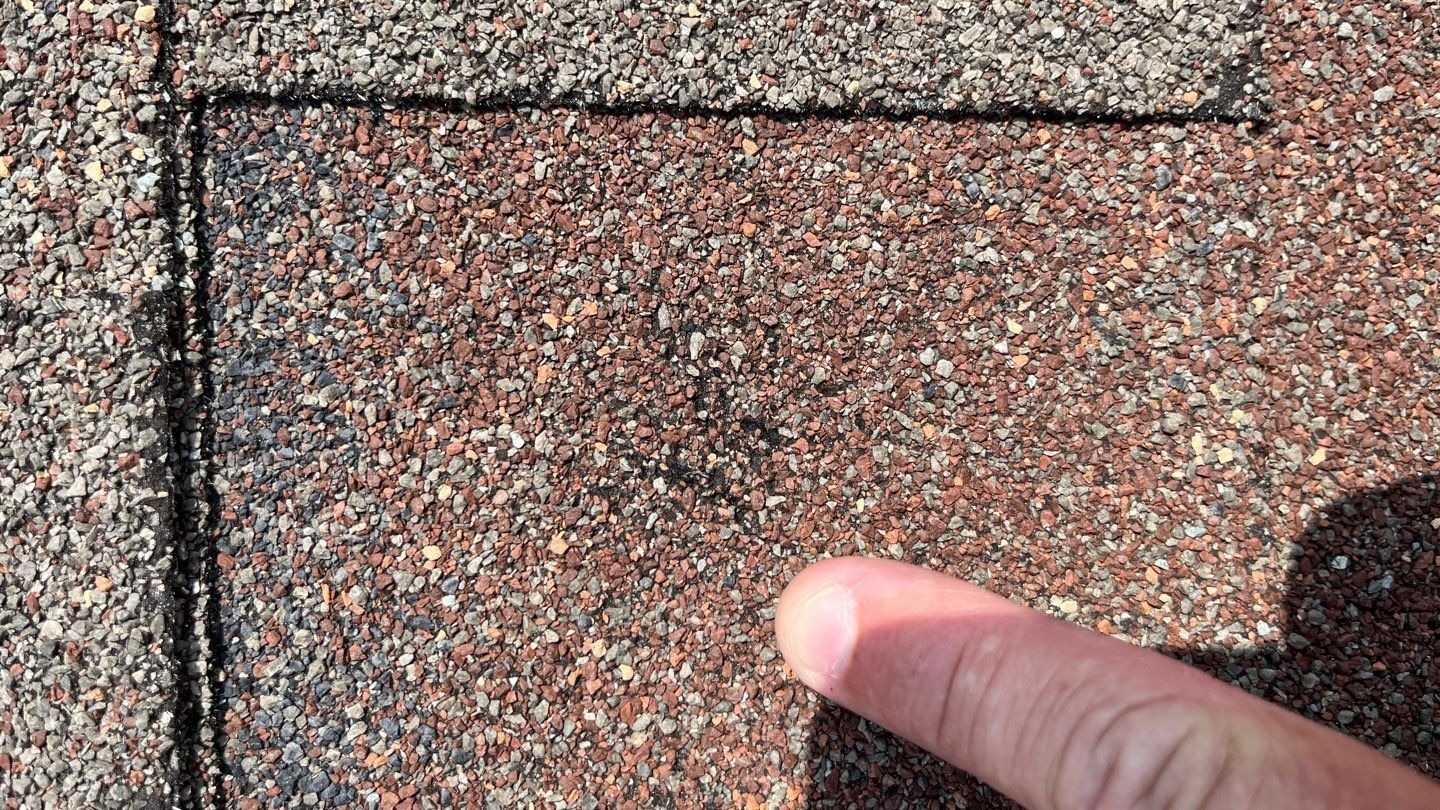 Granule loss visible on damaged shingles before the roof replacement in Allen, TX