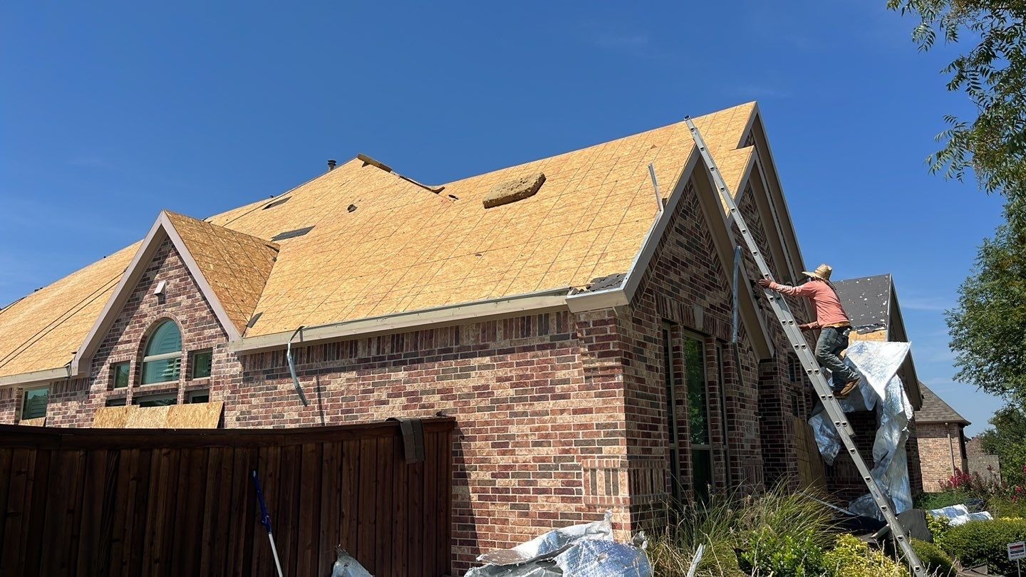 Roof deck exposed after tear-off during the roof replacement in Allen, TX