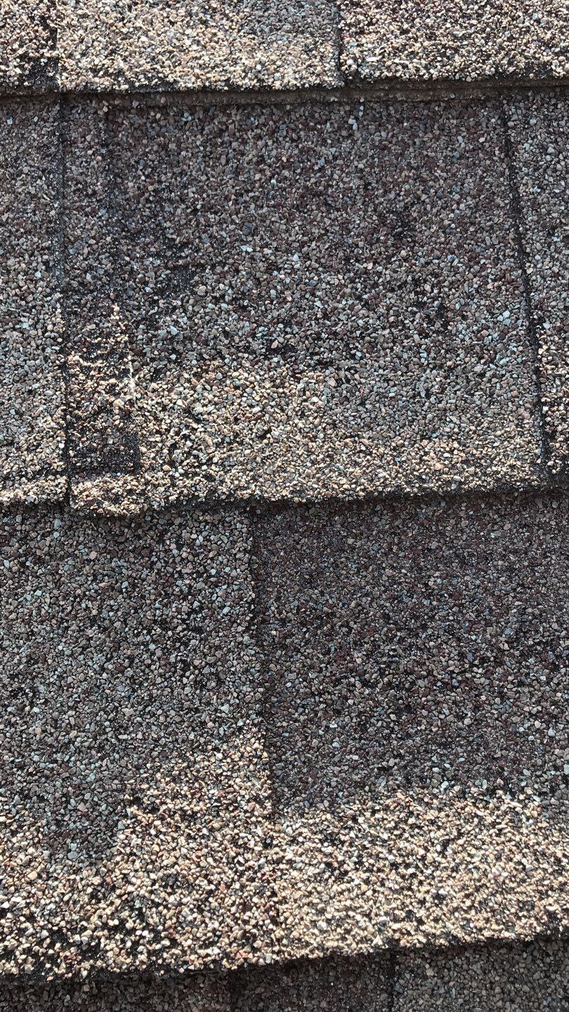 Granule loss and impact marks found before the roof replacement in McKinney, TX