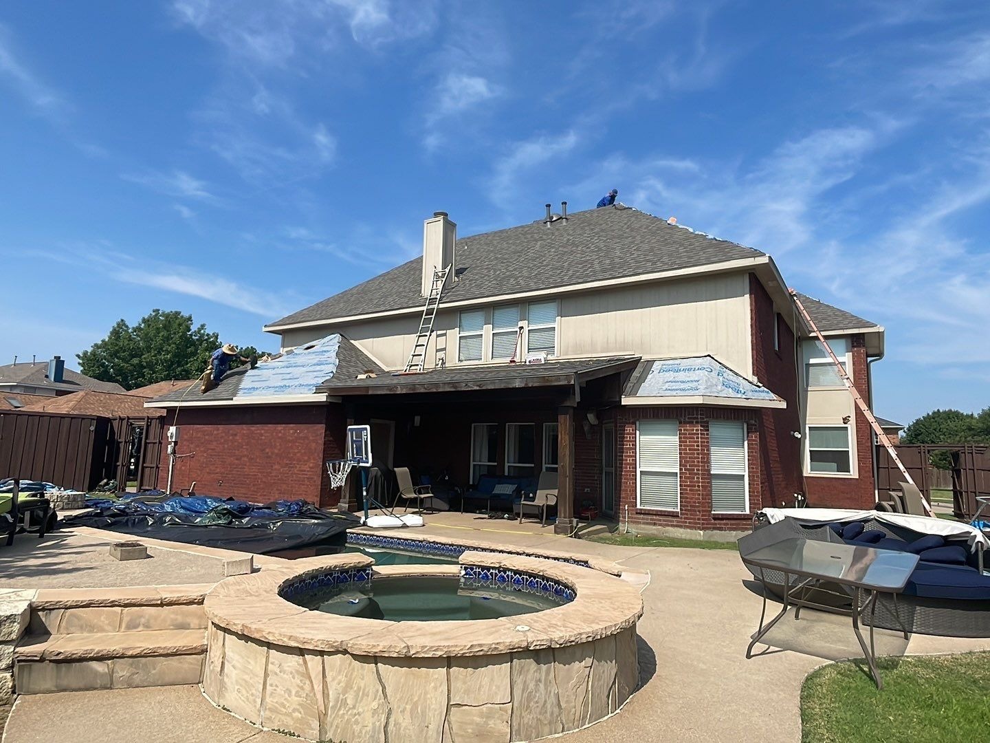 Flashing being replaced along a roof edge during roof replacement in McKinney, TX