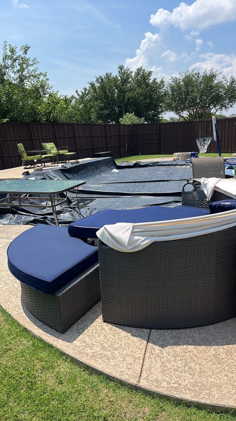 Crew beginning full tear-off of damaged shingles during roof replacement in McKinney, TX