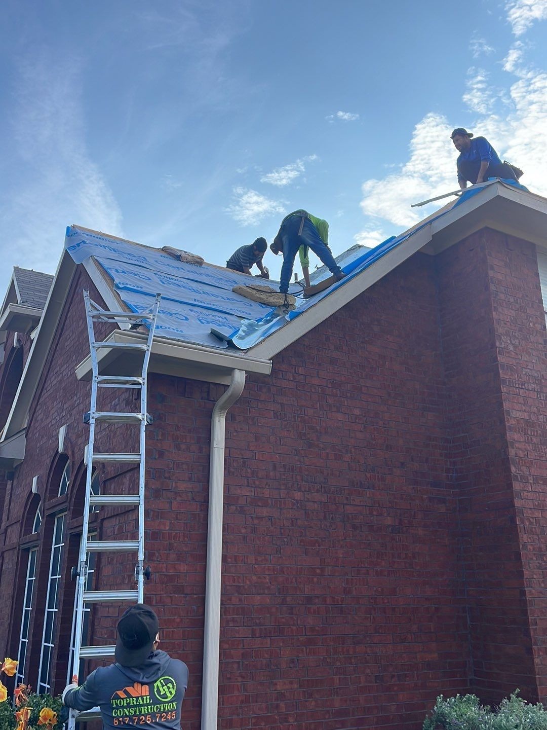 Exposed roof decking revealed mid-tear-off during the McKinney, TX roof replacement