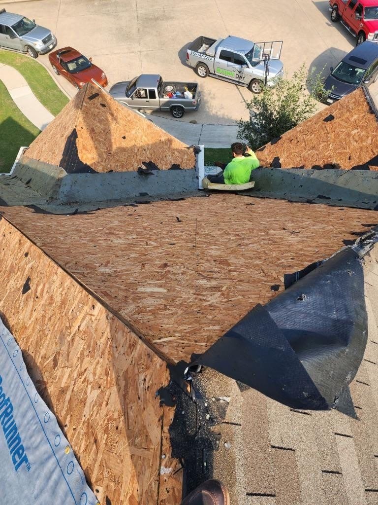 Pool covered with a large tarp for protection during roof replacement work in McKinney, TX