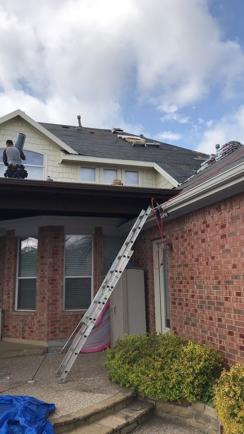 Modified bitumen roll roofing being installed on the patio cover in Allen, TX