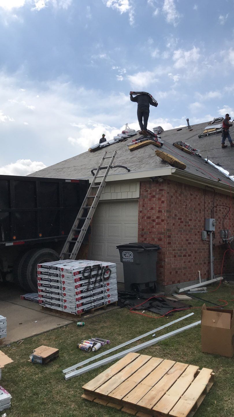New shingles being installed during the roof replacement in Allen, TX