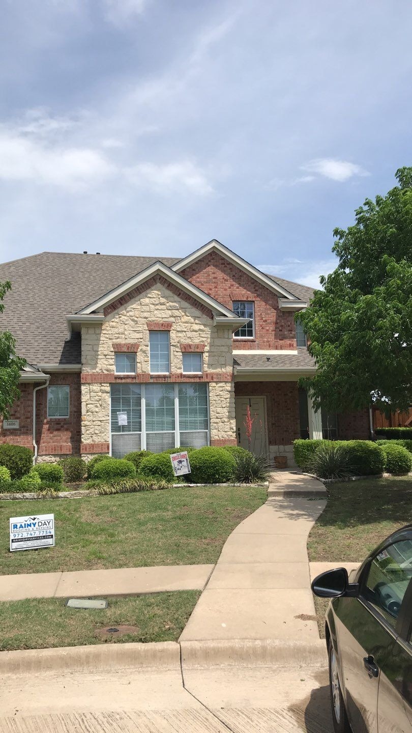 Completed roof with new shingles and flashing after the roof replacement in Allen, TX