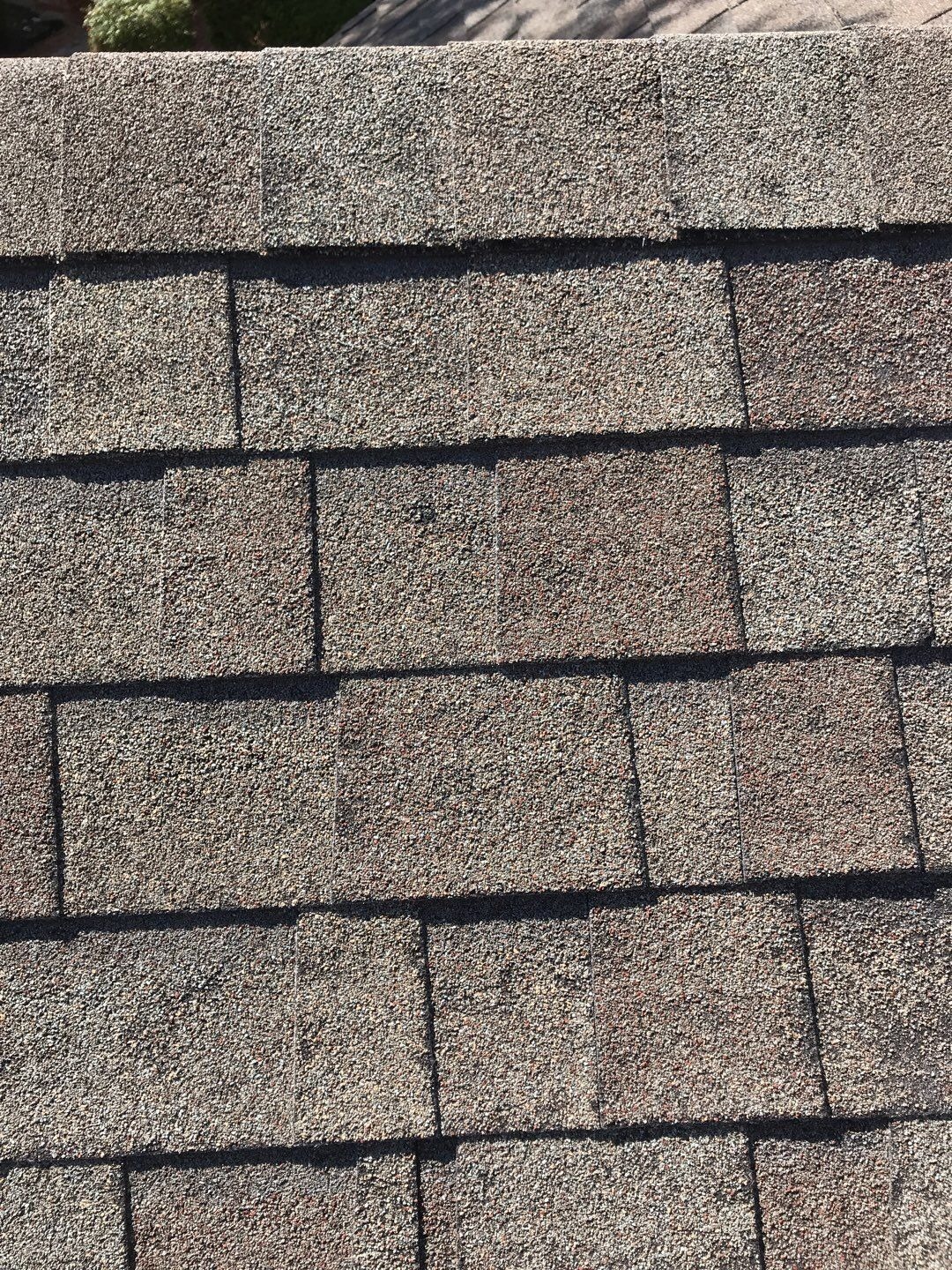 Patio cover roofing material worn and damaged before replacement in Allen, TX