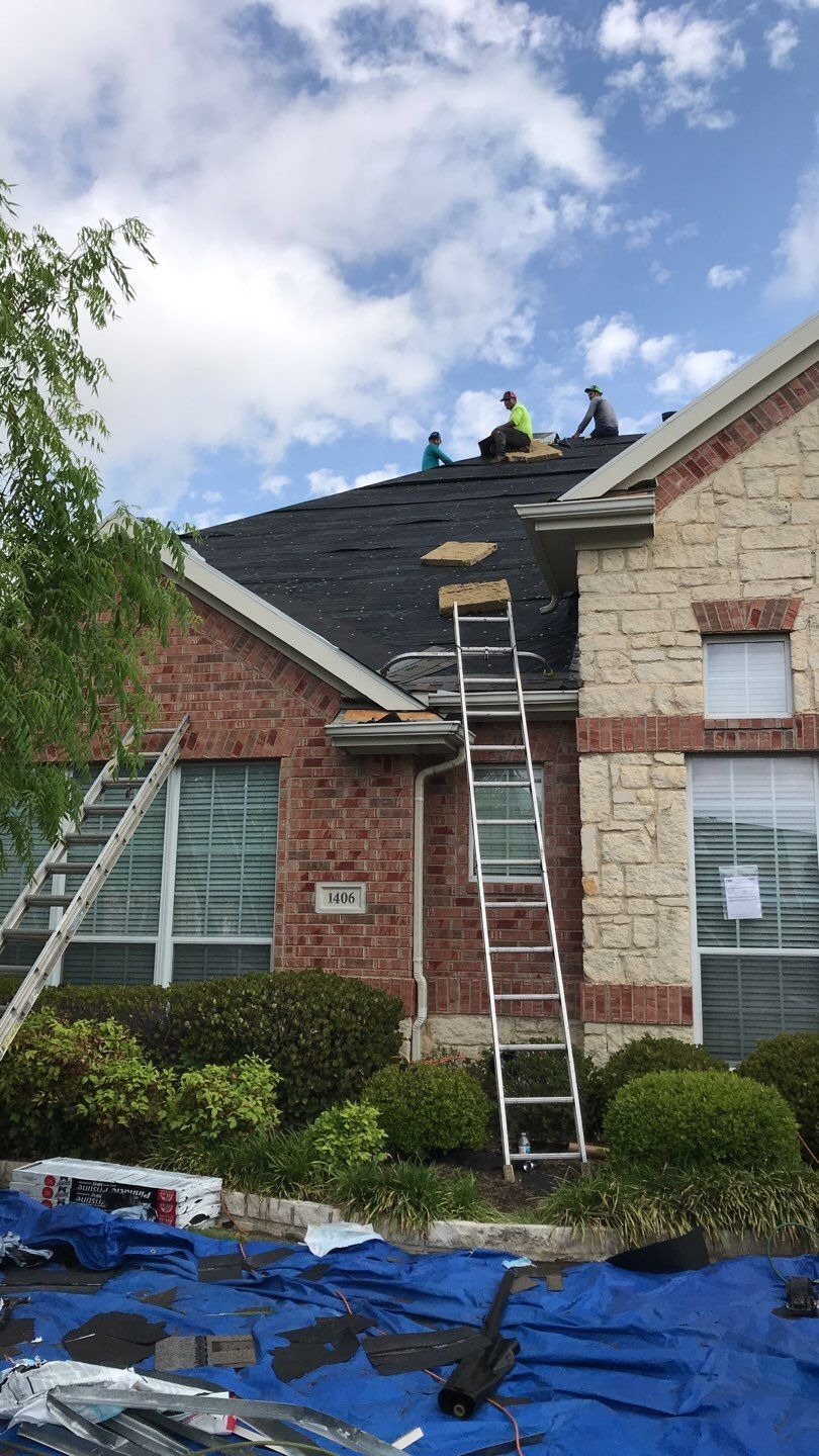 Roof deck exposed after tear-off during the roof replacement in Allen, TX