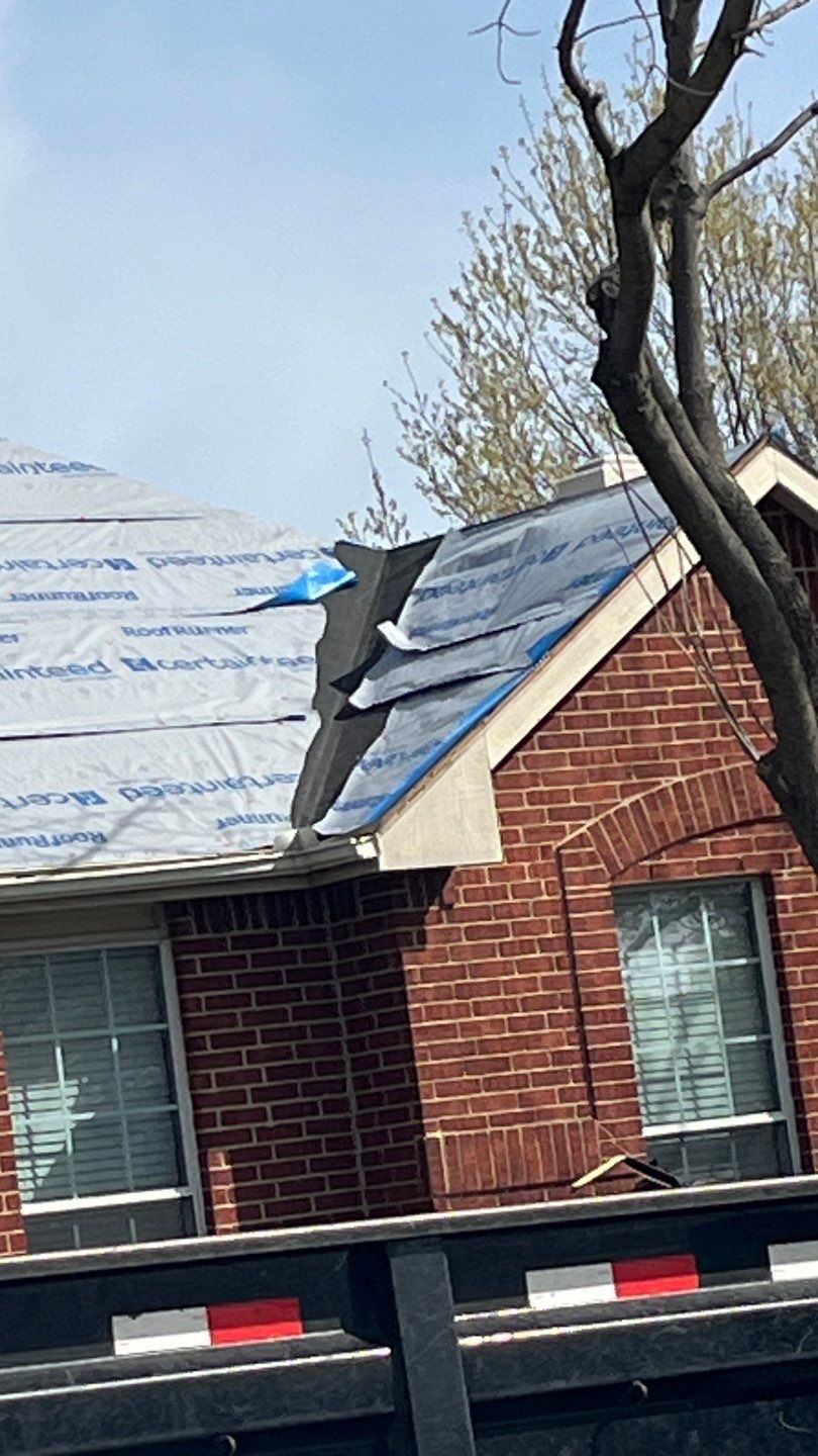 New underlayment being installed during the roof replacement in Allen, TX