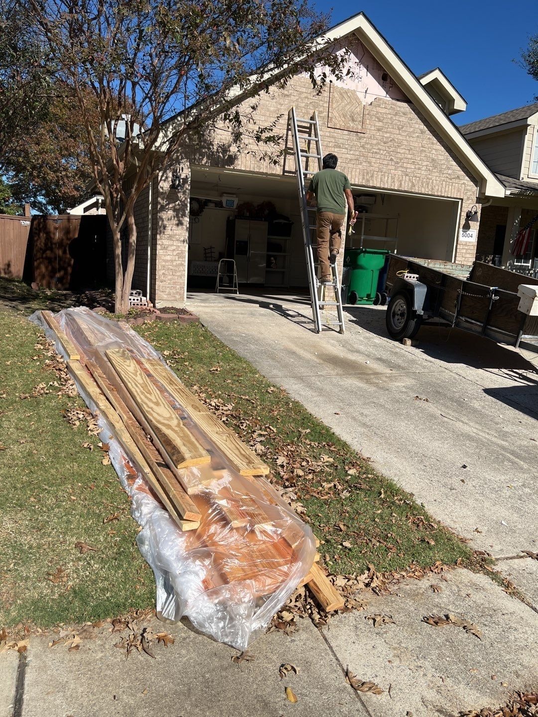 Old garage doors detached during the reconstruction project in McKinney, TX